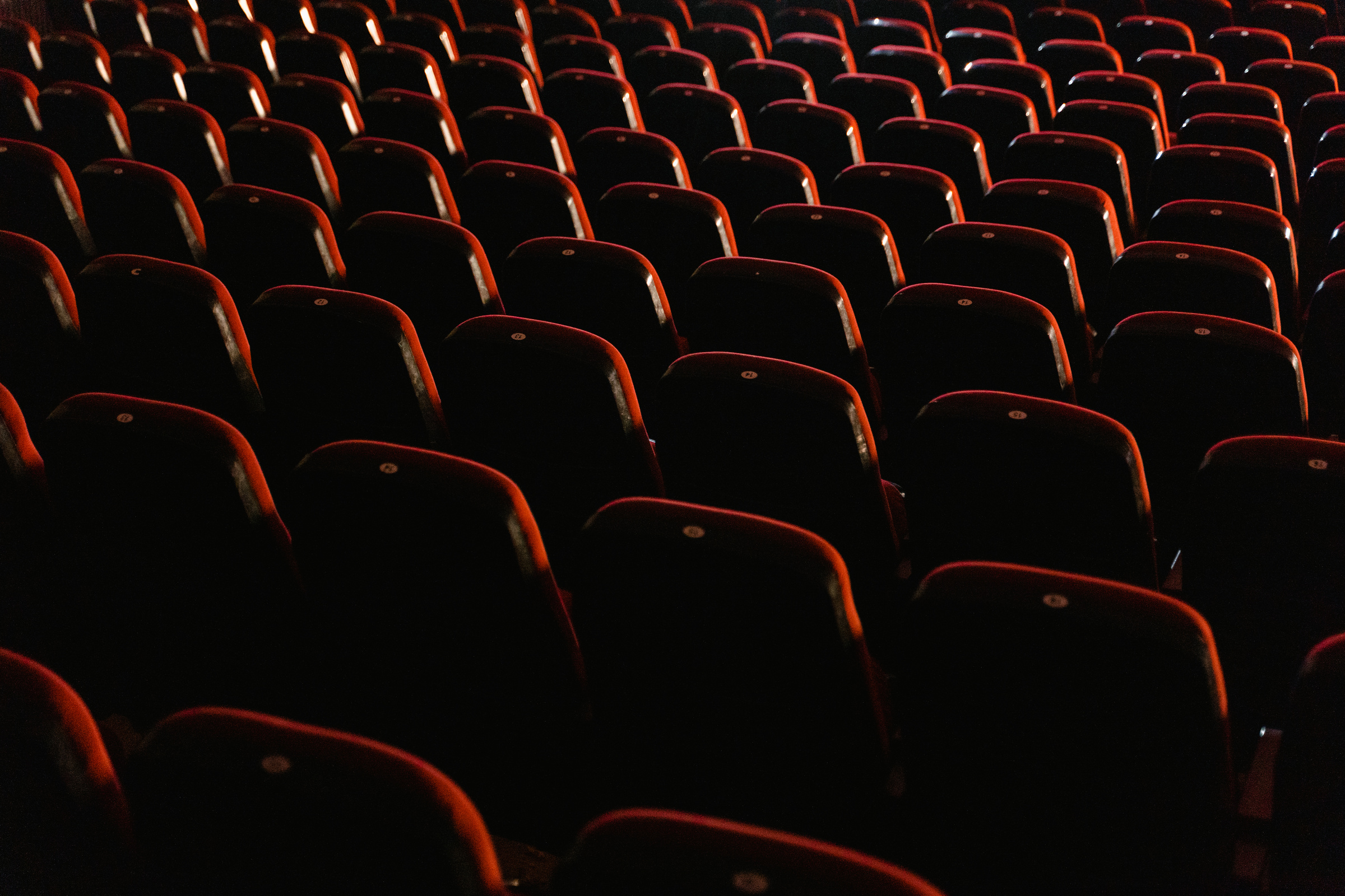 Empty Seats of the Chairs inside the Movie Theater
